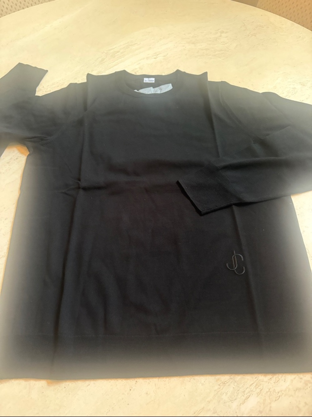 Jimmy choo women’s black round neck sweater. Long sleeve